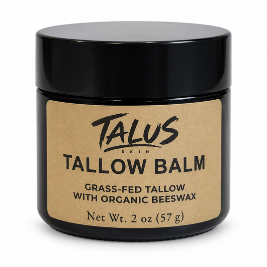 Talus Skin Tallow Balm in a black glass jar, 2 oz (57 g).